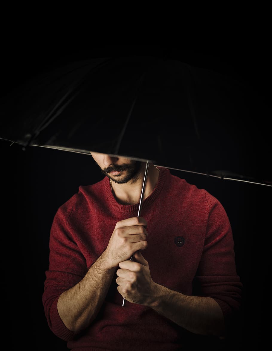 man in red sweater, one person, holding, real people, front view HD wallpaper