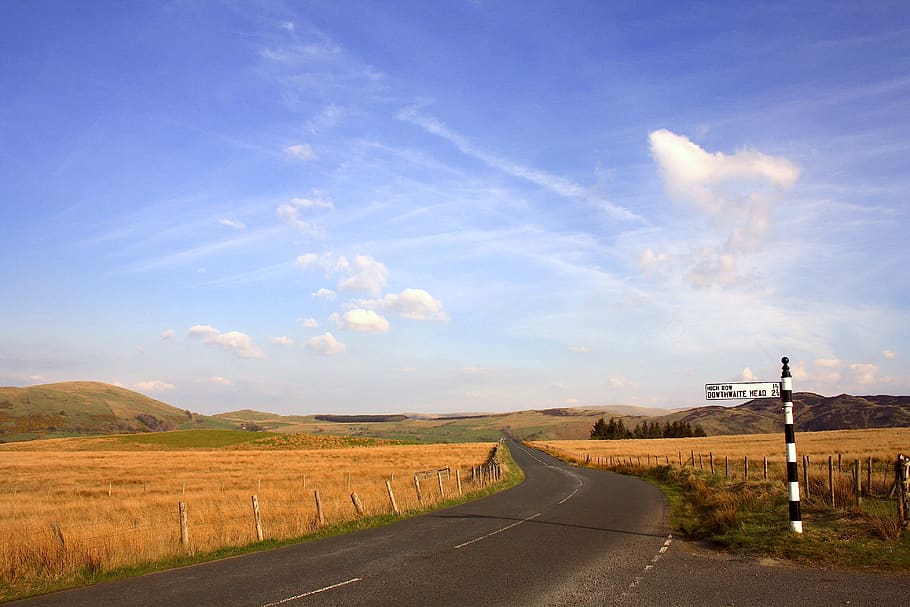 mountains, blue sky, wheat, sunny, signpost, april, road, direction HD wallpaper
