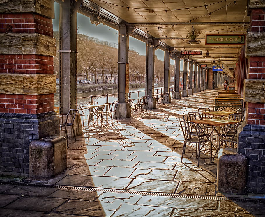 Table and Chairs Inside Tunnel Beside Body of Water, architecture HD wallpaper