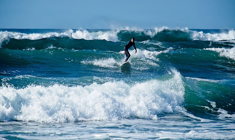person surfing during daytime, sea, sport, wave, motion, aquatic sport HD wallpaper