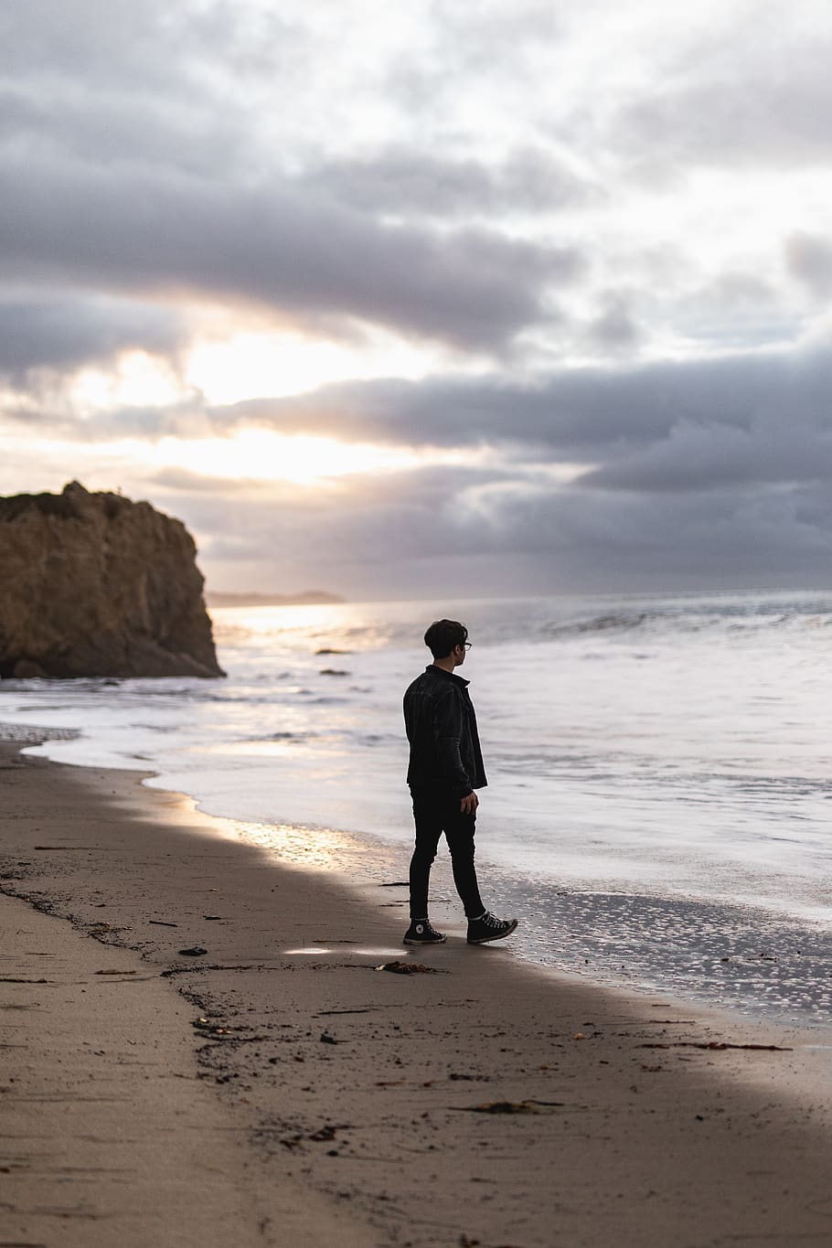 man standing on seashore, water, outdoors, ocean, nature, person HD wallpaper