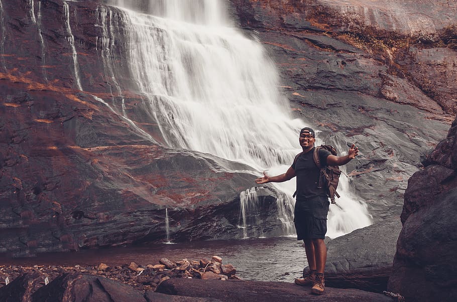Photo of Man Standing Near Waterfalls, adventure, backpack, care, HD wallpaper