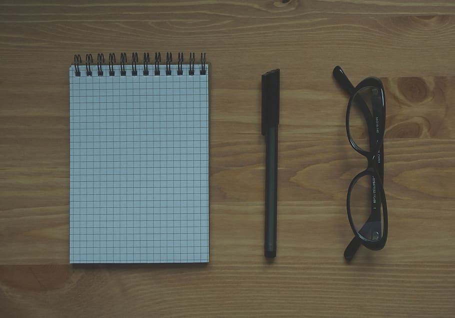 Black Framed Eyeglasses Near Graphing Paper Spiral Notebook, desk HD wallpaper