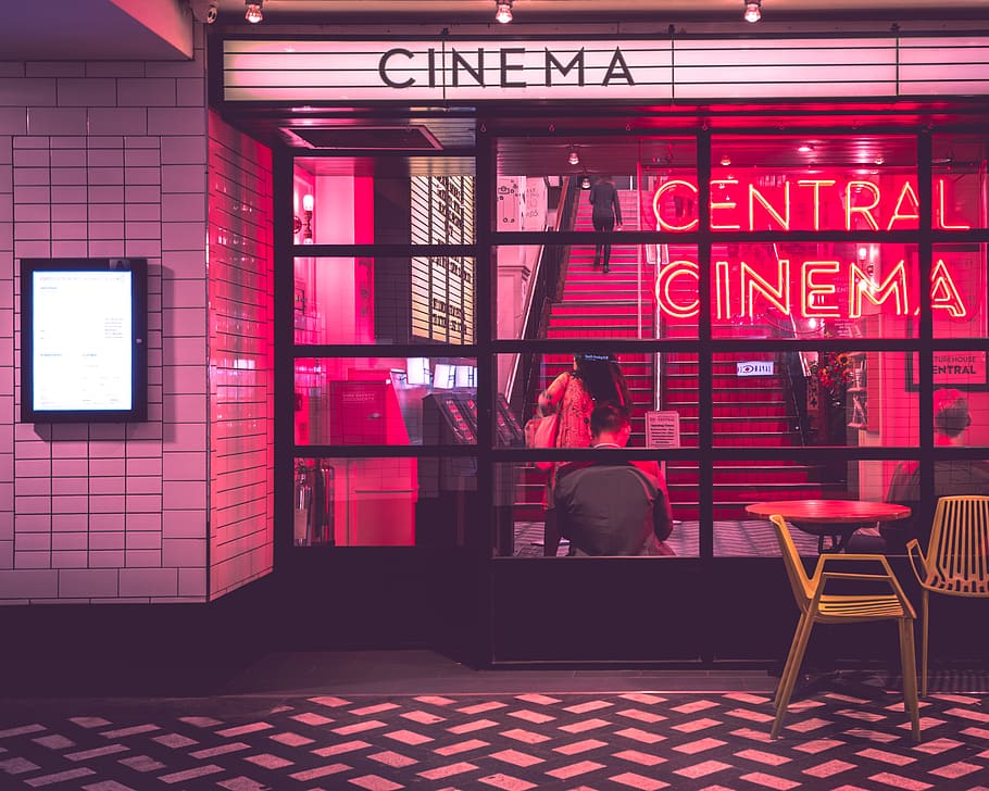 photography of Cinema, building, city, street, pink, red, glow