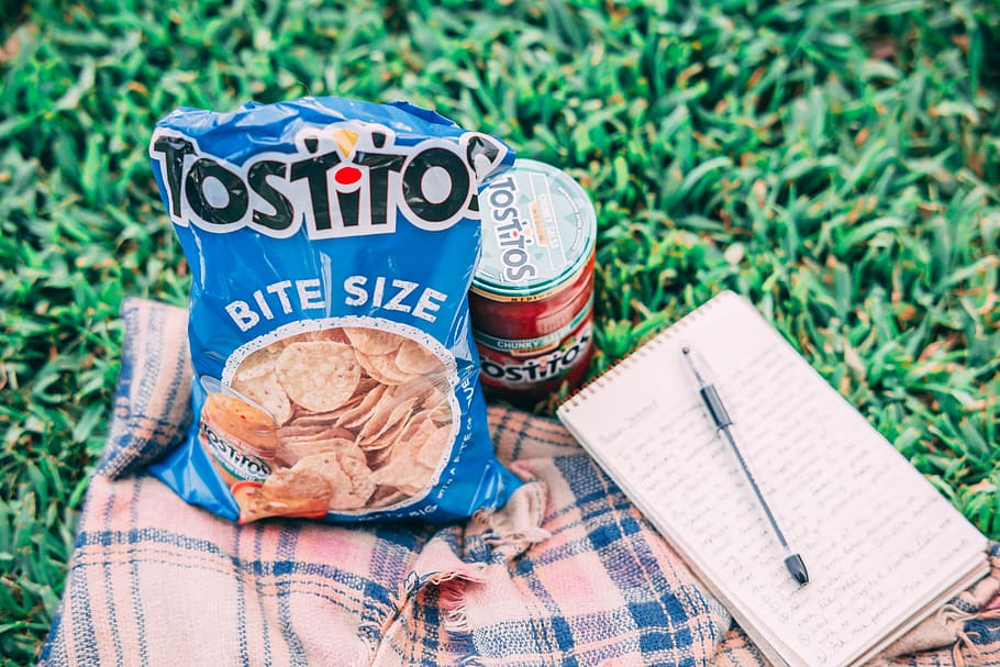 Tostito Pack Beside Can and Notebook, blanket, chips, close-up, HD wallpaper