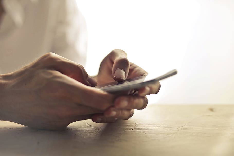 Person Using Smartphone, blurred background, close-up, device HD wallpaper