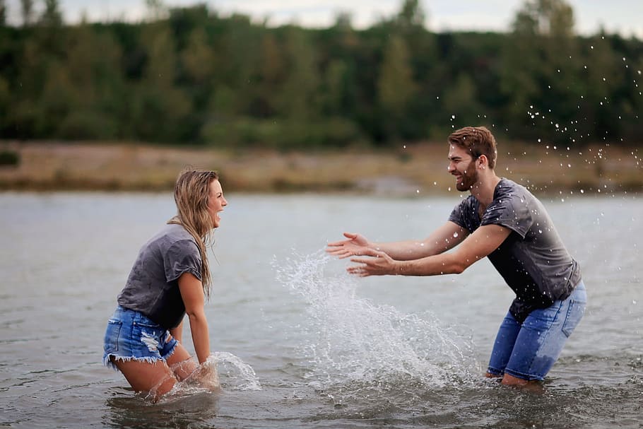 Man and Woman Playing on Body of Water, blurred background, boyfriend, HD wallpaper