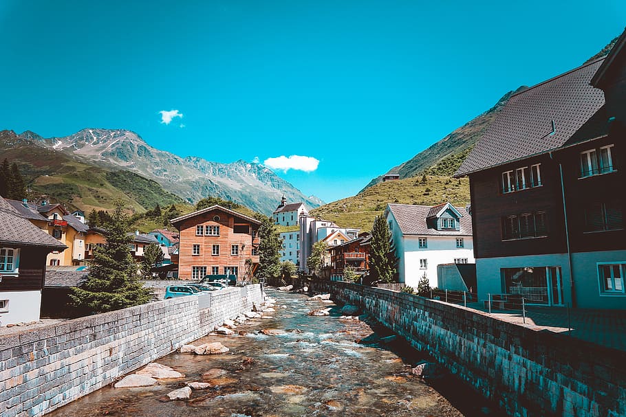 Canal Between Buildings, alps, architecture, daylight, houses HD wallpaper