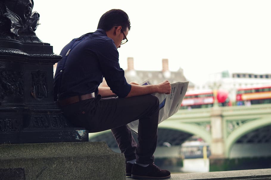 man reading a newspaper, person, people, human, car, vehicle HD wallpaper