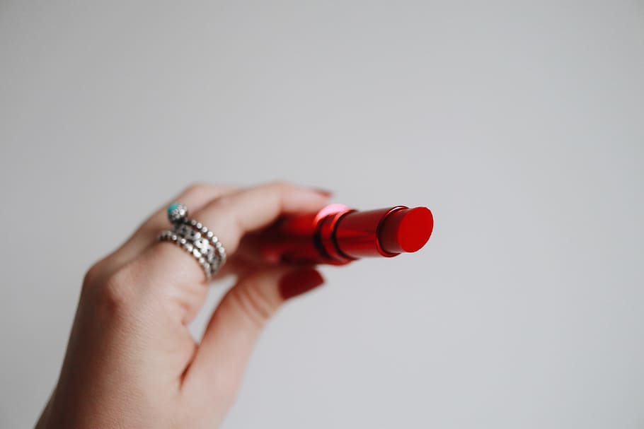 person holding red lipstick, lip balm, hand, ring, makeup, beauty HD wallpaper