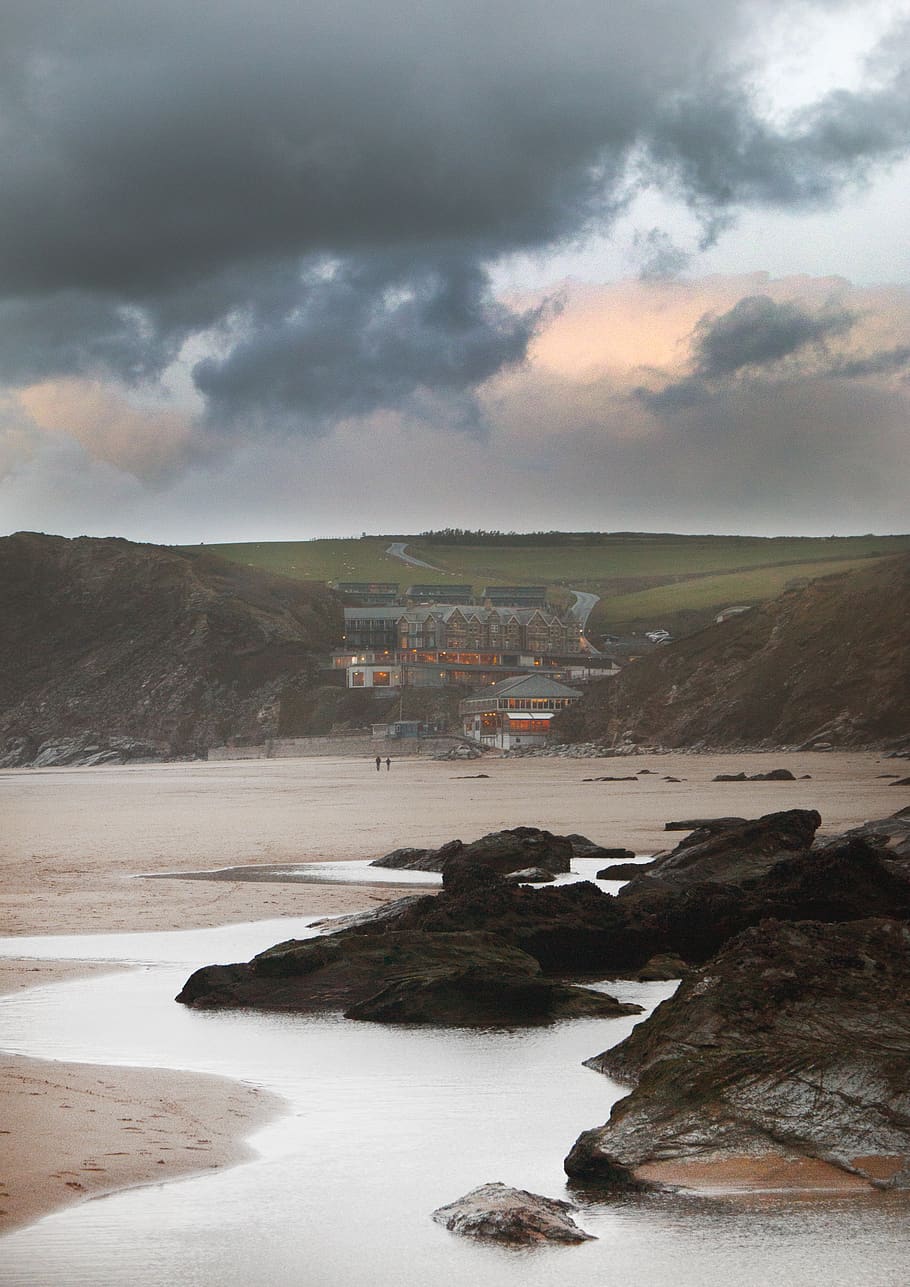 Buildings by Cliff Near Shore Under Cloudy Sky, beach, clouds HD wallpaper