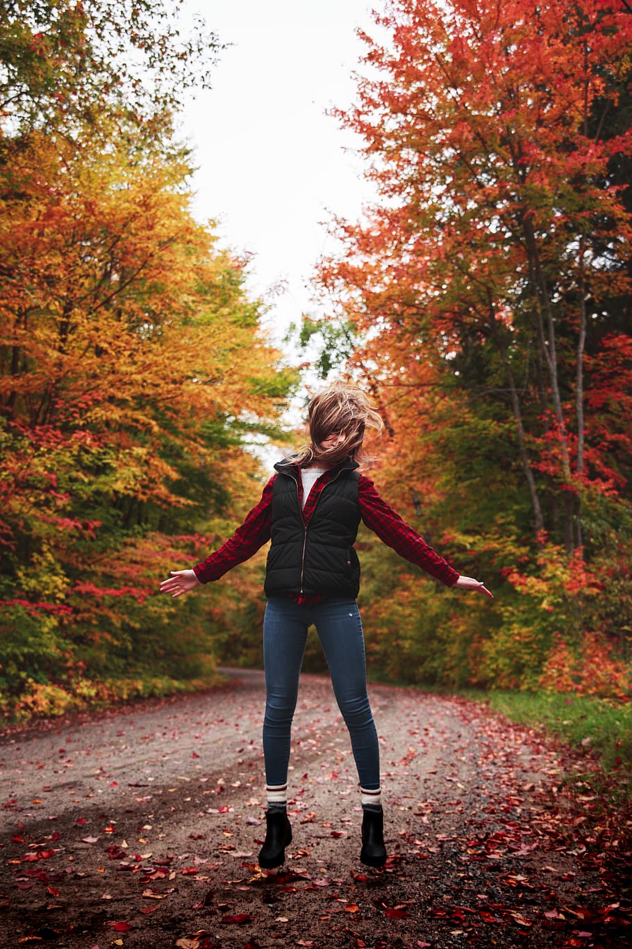 HD wallpaper: woman standing on empty road between maple trees, autumn, one  person | Wallpaper Flare