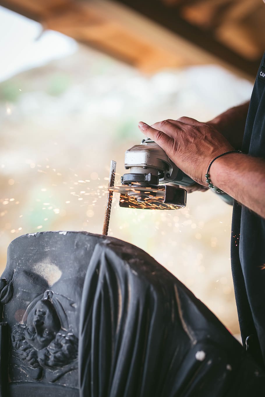person using gray angle grinder, human hand, real people, one person HD wallpaper