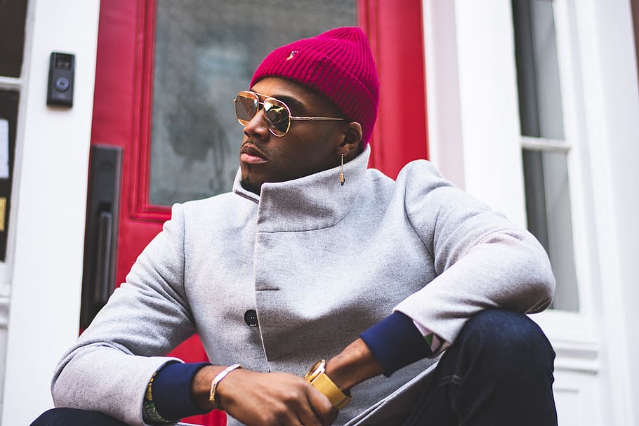 Man Sitting on Front of Red Halflite Door, beanie, blur, bonnet HD wallpaper