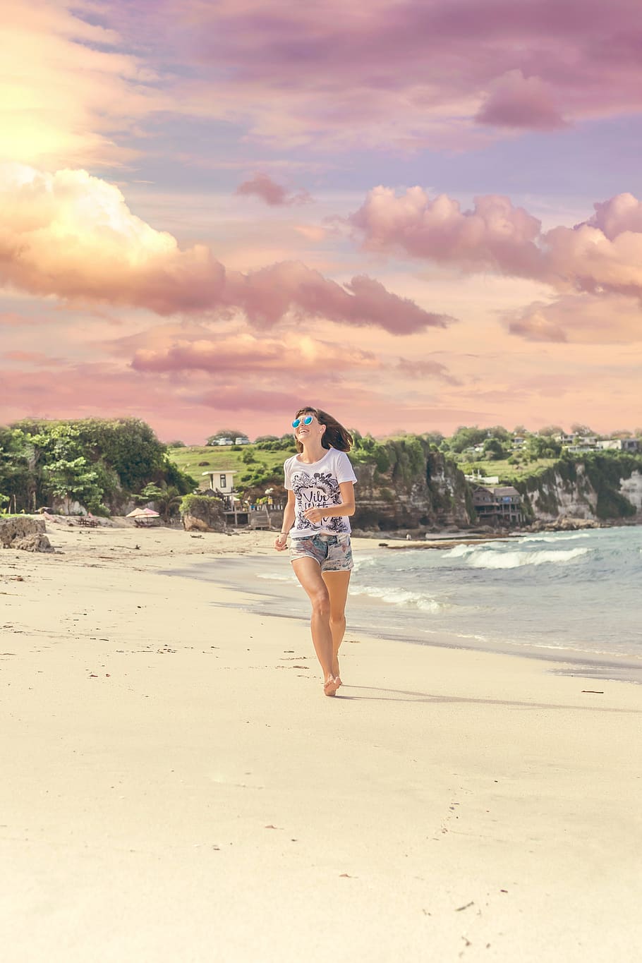 Smiling Woman Walking Barefood on Seashore Near Houses, barefoot HD wallpaper