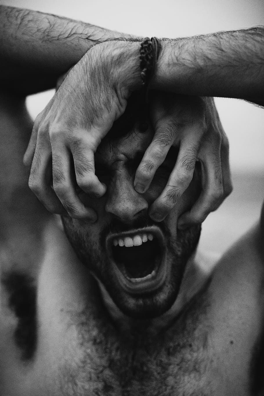 grayscale photo of man touching his face, male, hand, scream