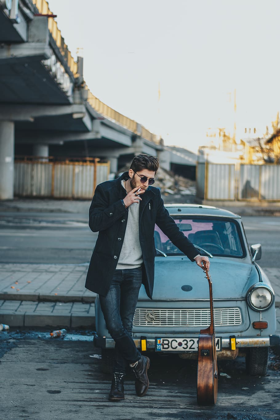 man leaning on guitar, real people, mode of transportation, young adult HD wallpaper