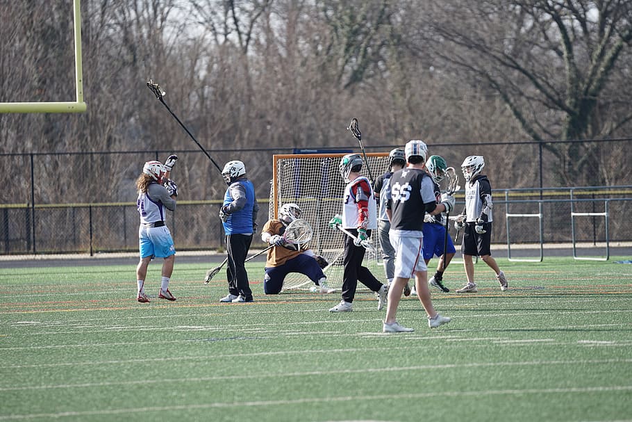 people playing lacrosse, human, person, clothing, apparel, helmet