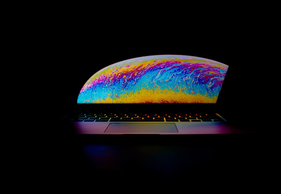 gray laptop computer turned on, multi colored, black background HD wallpaper