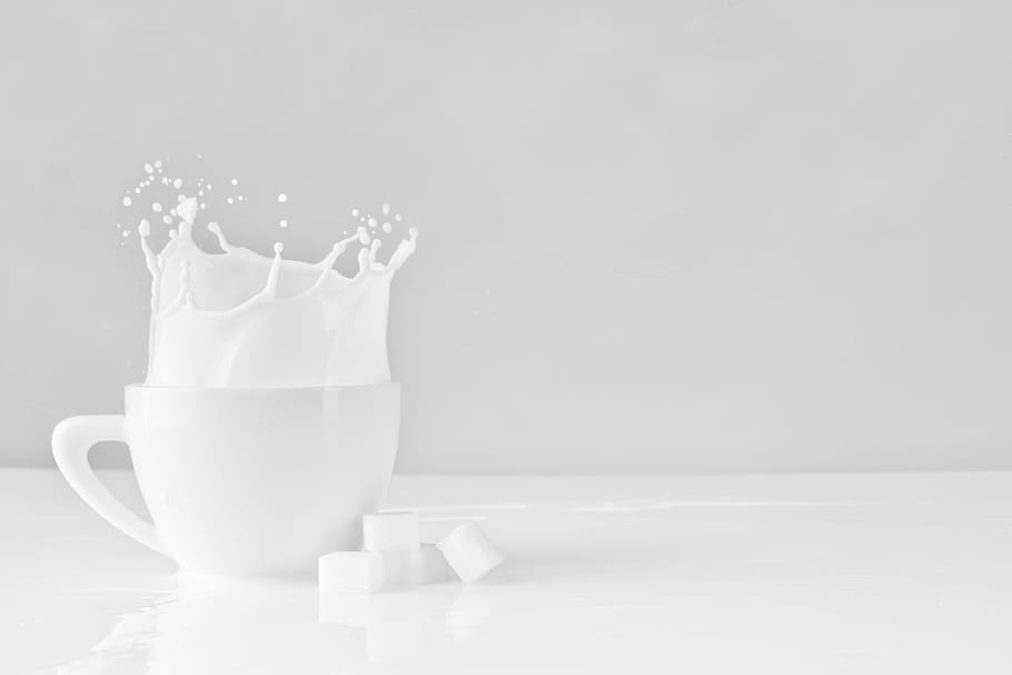 sugar block dropped on white cup with milk, motion, splash, movement HD wallpaper