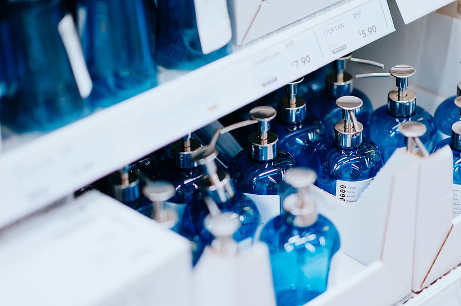 boxed blue pump bottles, indoors, selective focus, close-up, technology HD wallpaper