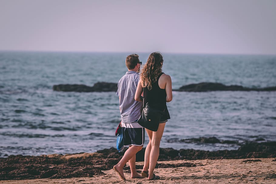 Woman and Man Walking Near Seashore, back view, beach, couple HD wallpaper