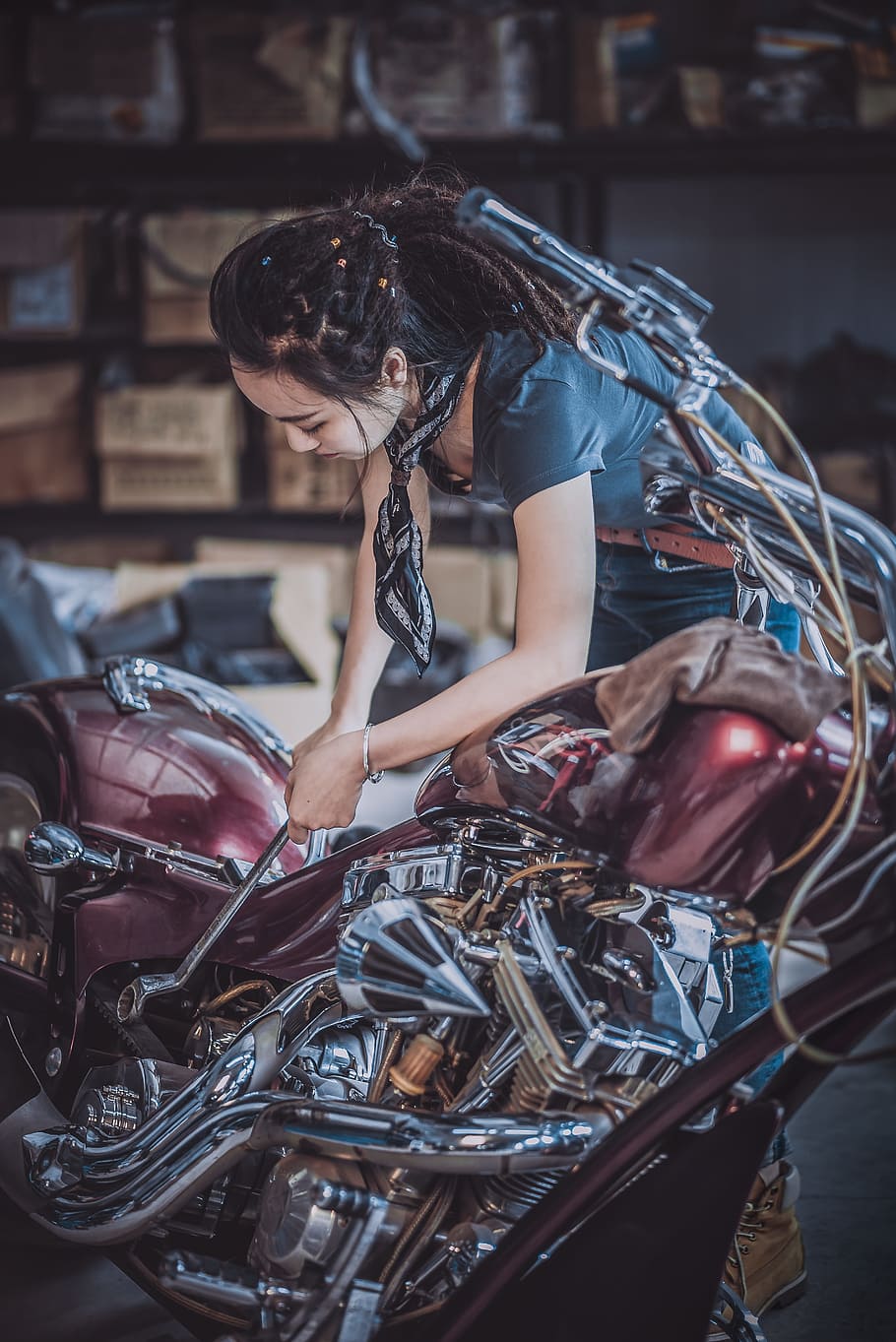 photo of woman repairing motorcycle, motorbike, person, wrench