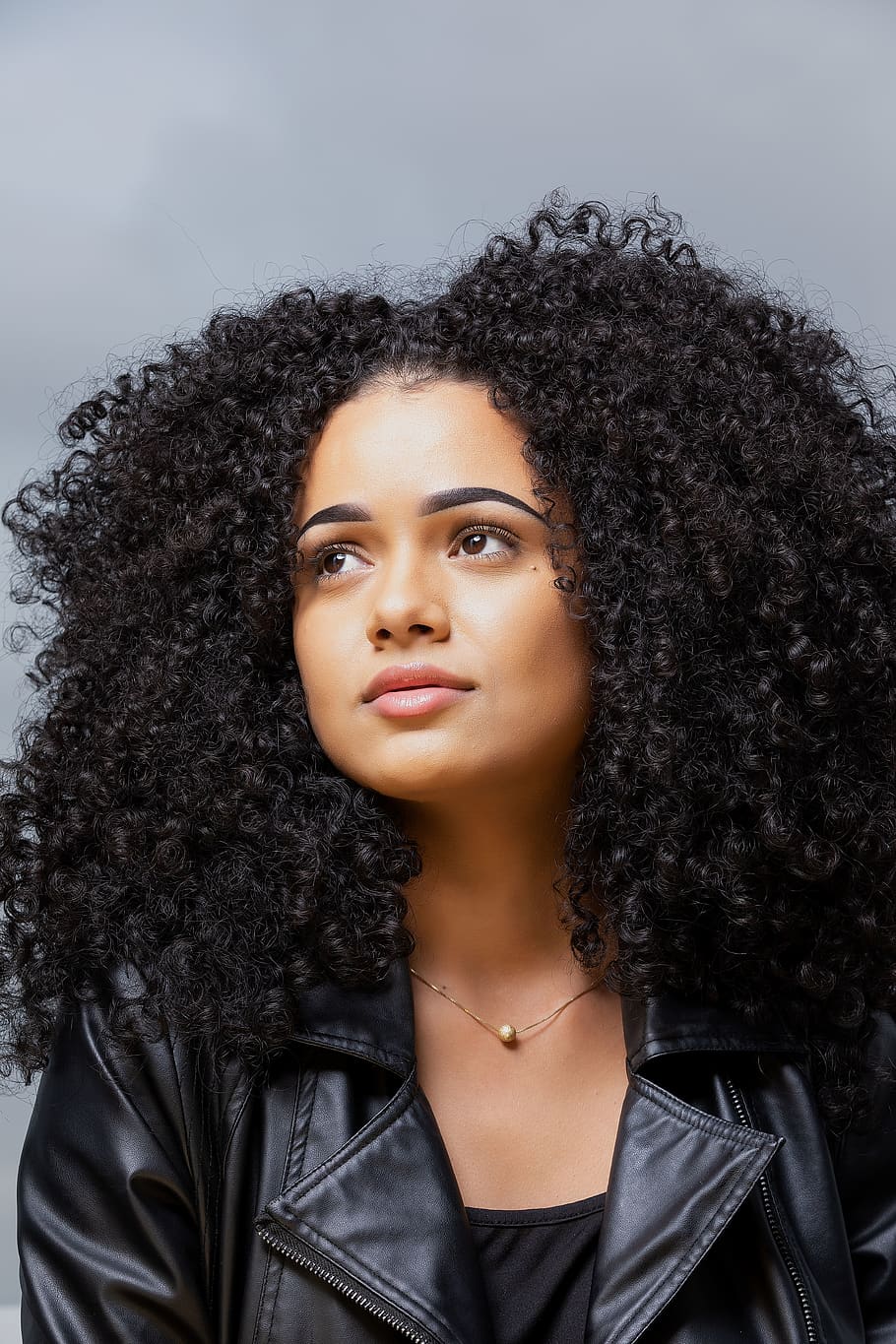 Woman in Black Leather Jacket, afro, attractive, beautiful, beauty