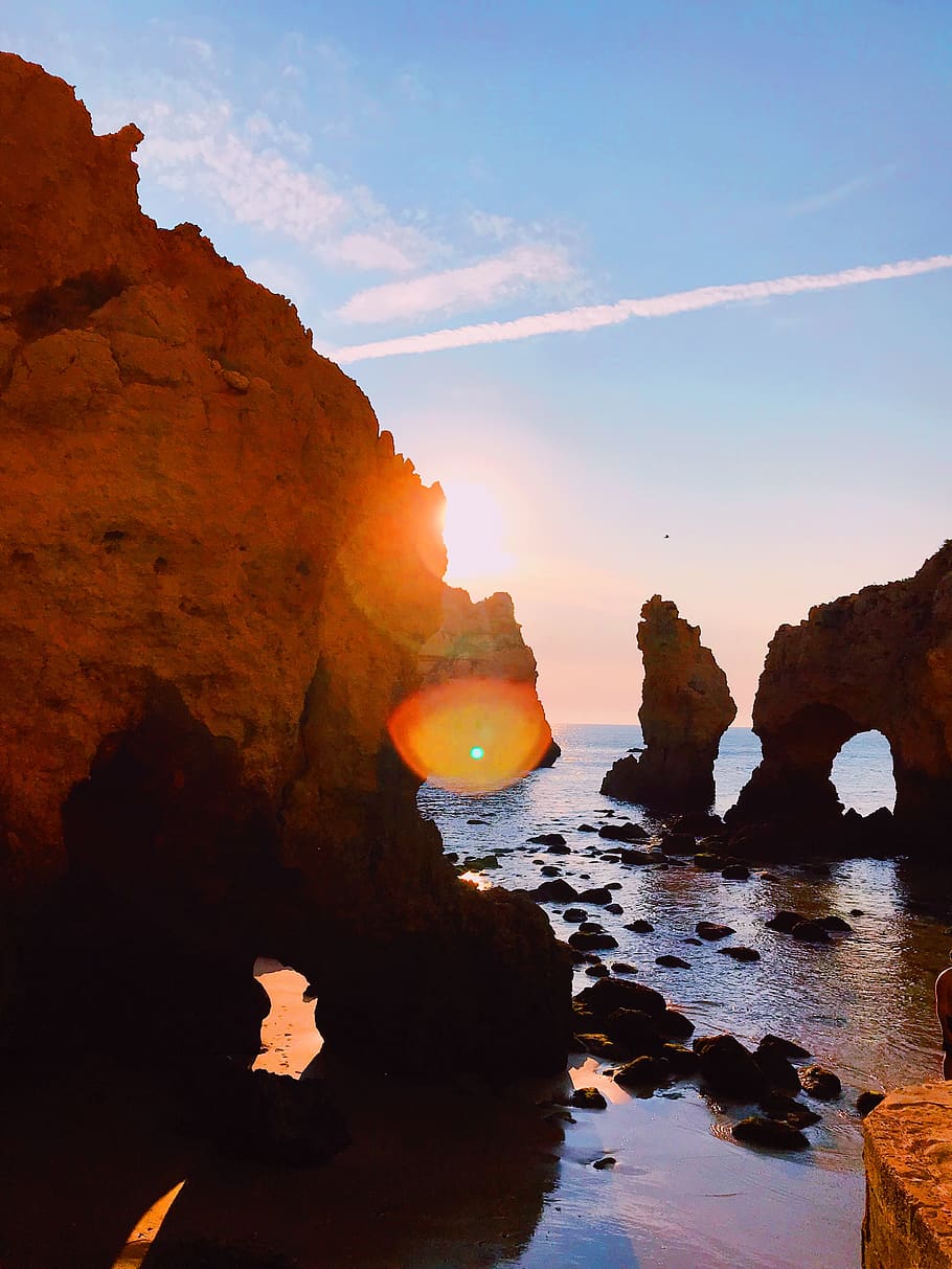 Rock Formation Near the Ocean Photography, backlit, beach, clouds HD wallpaper
