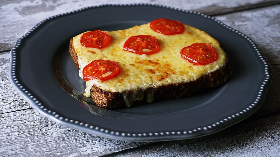 Pizza on the Black Plate, bread, cheese, close-up, delicious HD wallpaper