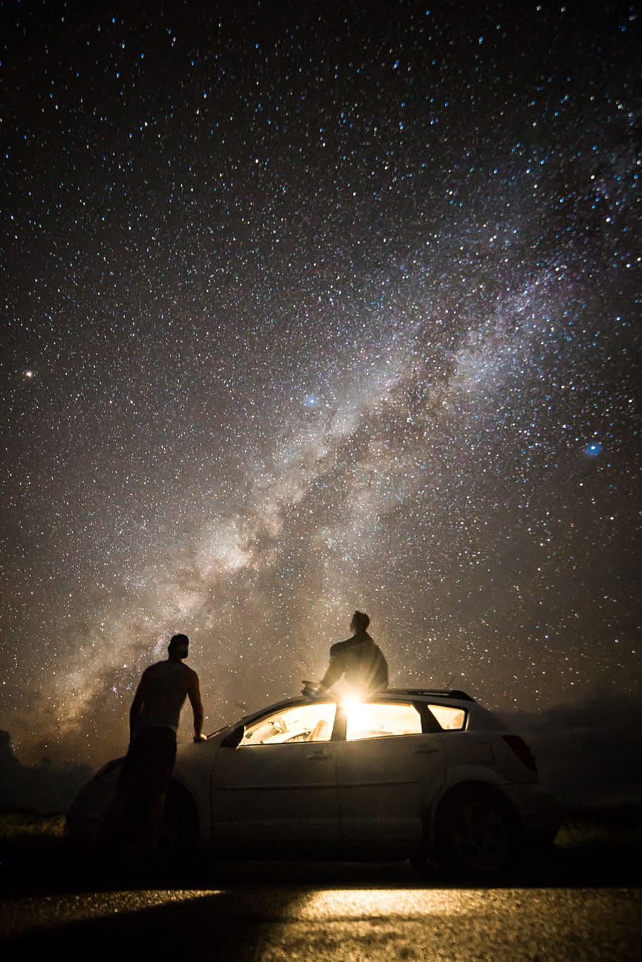 man sitting on the roof of the car watching the stars, space, HD wallpaper