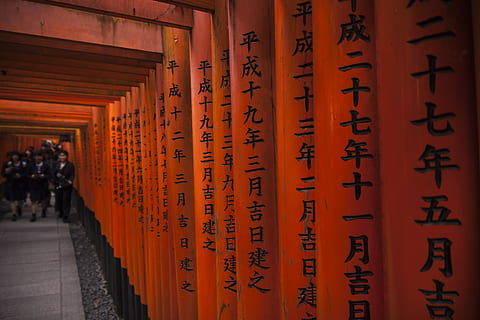 brown and black Kanji script wall, person, human, architecture HD wallpaper