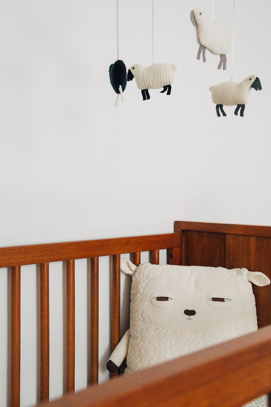 HD wallpaper: crib with sheep pillow and crib mobile, wood - material,  indoors | Wallpaper Flare