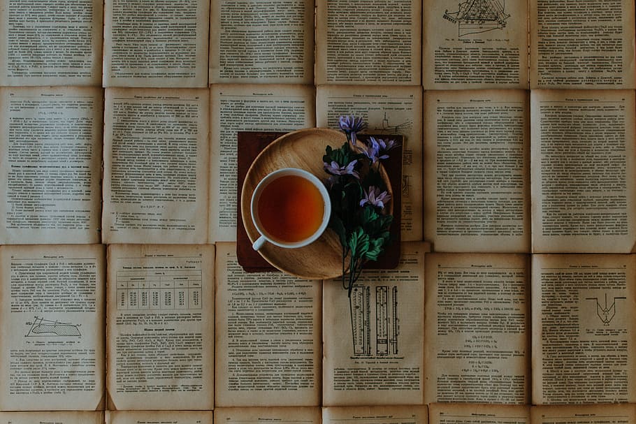 cup of coffee beside purple flowers on top of book, tea, vintage, HD wallpaper