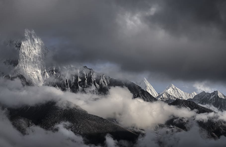 snowy mountain peaks under dark clouds, cloud - sky, beauty in nature HD wallpaper