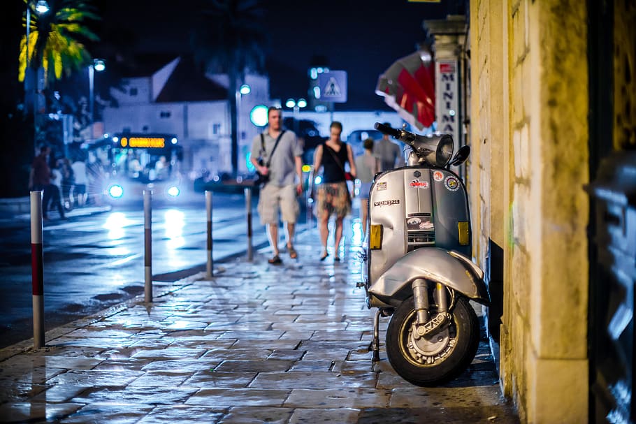 Grey Motorcycle, city, night, path, pavement, people, scooter HD wallpaper