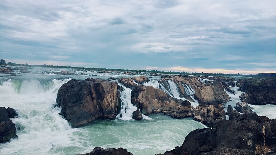 Landscape Photography of Rocks on Body of Water, beach, cliff HD wallpaper