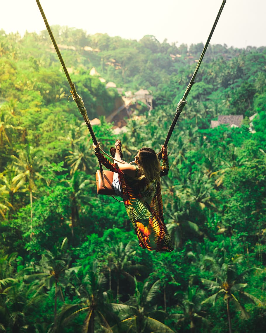 woman riding swing, plant, vegetation, outdoors, land, nature HD wallpaper