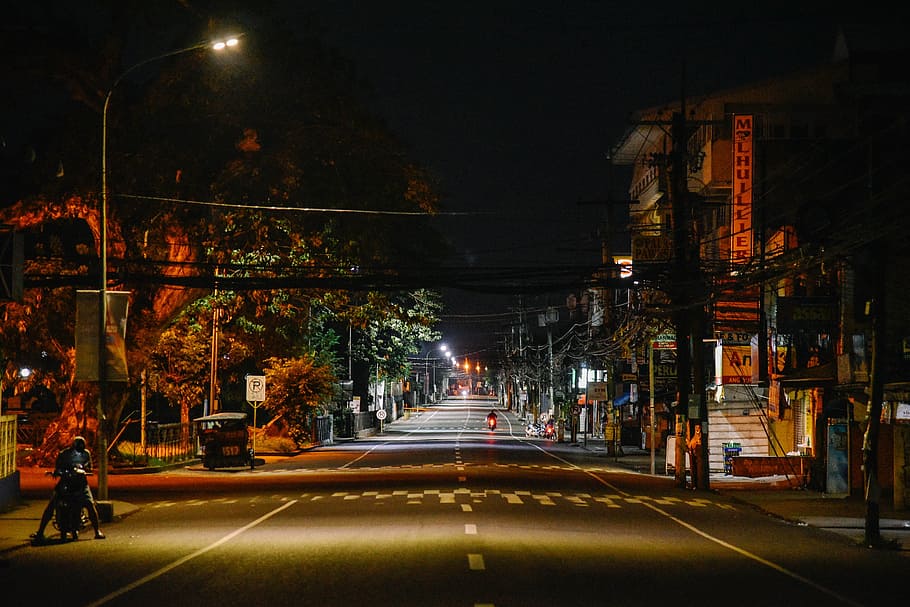 buildings-electric-posts-evening-illuminated.jpg