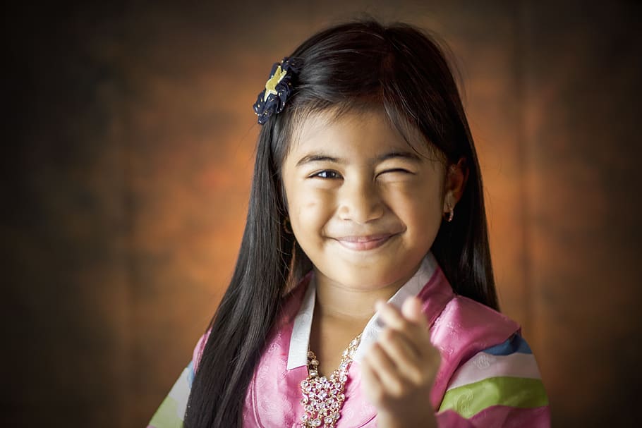 Girl Smiling Doing Finger Heart Sign, beautiful, child, cute HD wallpaper