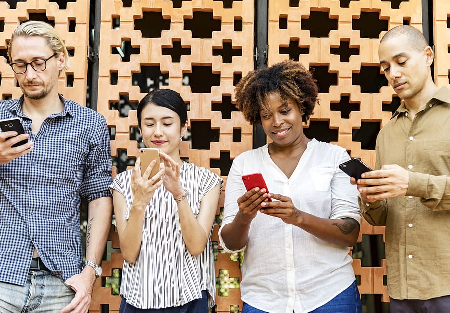 Four People Holding Mobile Phones, adult, busy, cellphone, communication