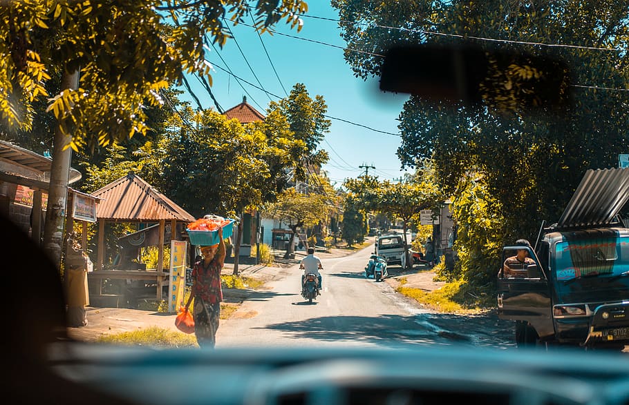 Person Inside Vehicle Viewing Woman Walking Beside Road, blur HD wallpaper
