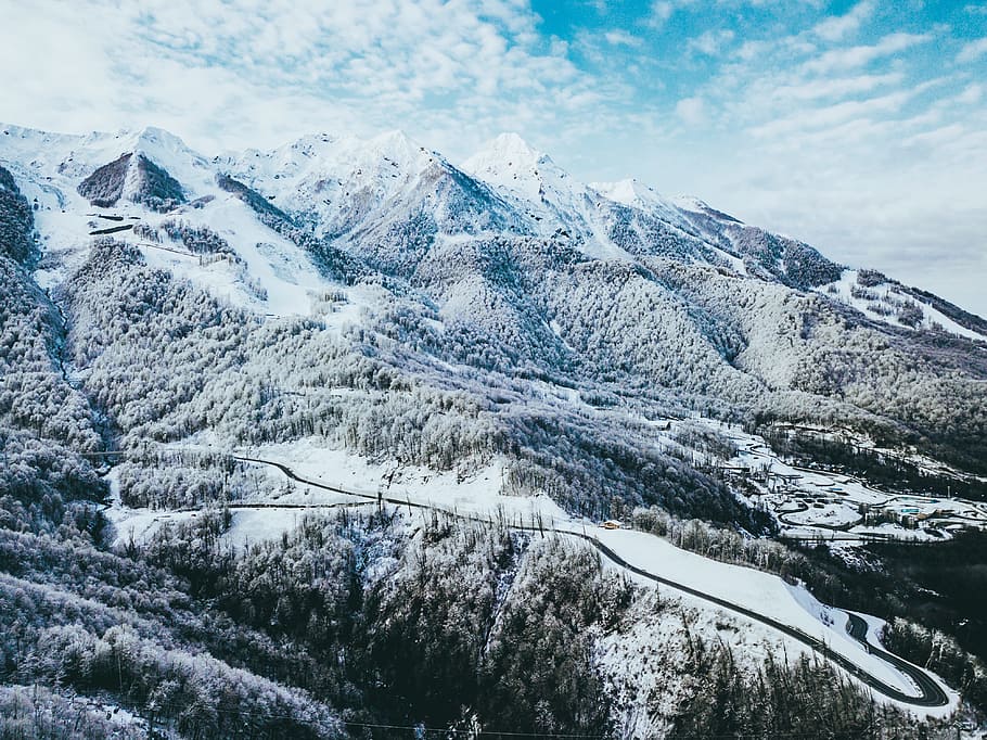 Mountains Covered in Snow Under Cloudy Sky, aerial, alpine, altitude HD wallpaper