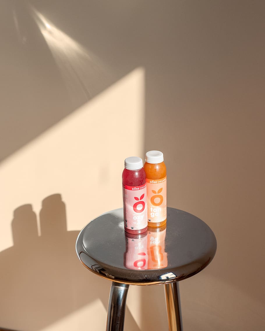 two smoothie bottles on stool, drink, beverage, soda, light, dose juice HD wallpaper