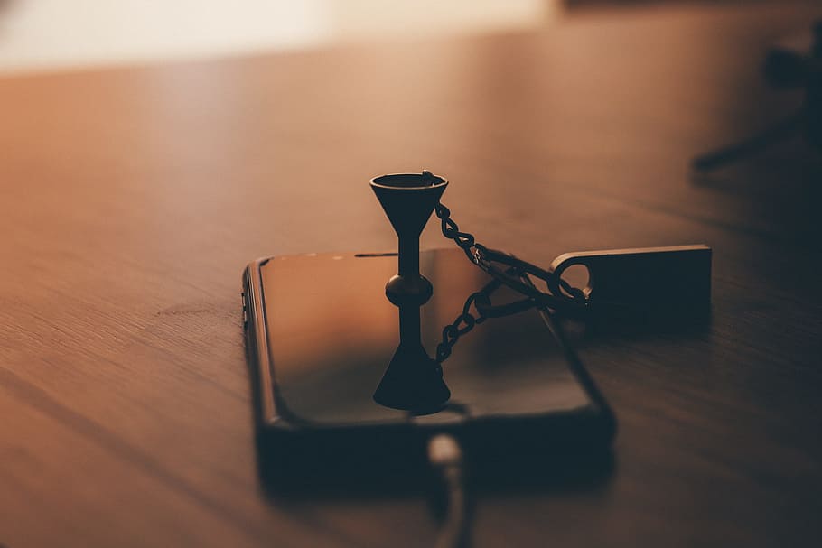Post-2017 Space Gray Iphone on Brown Wooden Table Close-up Photo HD wallpaper
