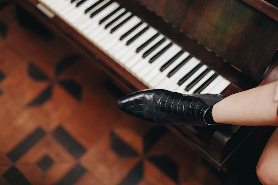 Person Wearing Unpaired Black Boot, boots, close-up, ebony, indoors HD wallpaper