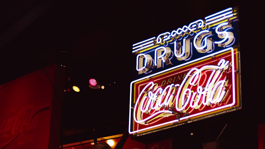 Drugs Coca-Cola neon sign at night time, text, illuminated, communication