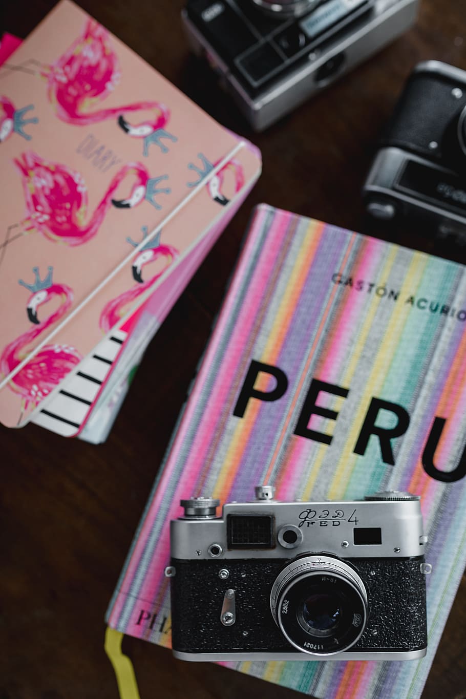 Old analog cameras and pink books on a wooden table, diary, flamingo HD wallpaper