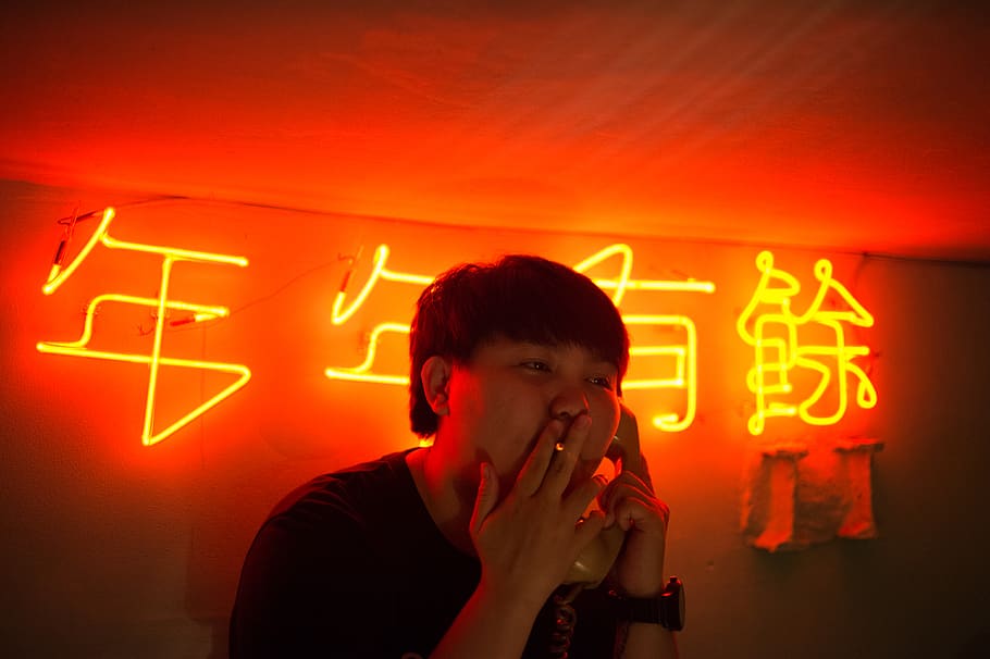 Man Wearing Black Shirt Standing Near Neon Signage, illuminated HD wallpaper