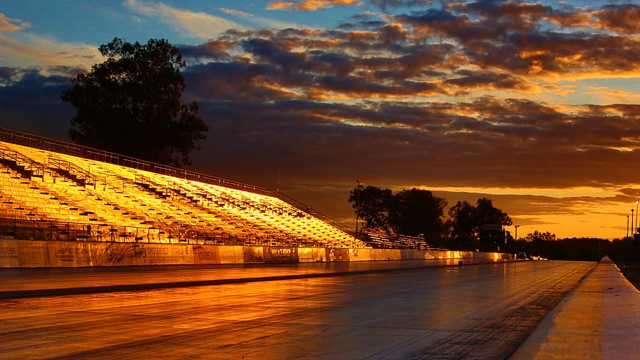 Asphalt Road Under Cloudy Sky during Sunset, architecture, bleachers HD wallpaper
